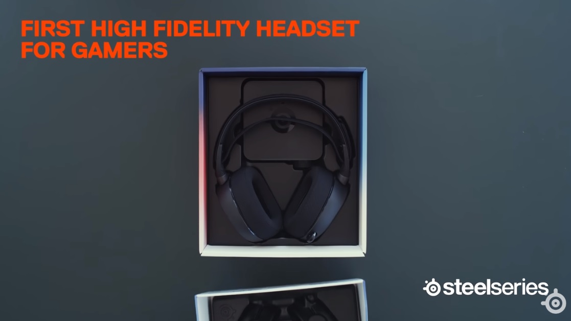 Arctis headphones in a box with the text "First High Fidelity Headset for Gamers" above and the SteelSeries logo in the corner