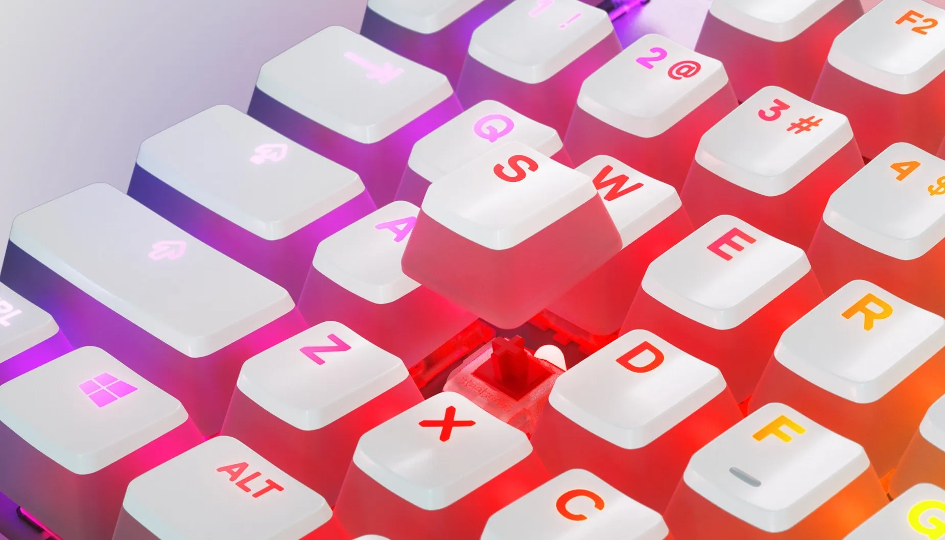 
 Close up of the RGB gleaming through the white prism, pudding style key caps.
 
