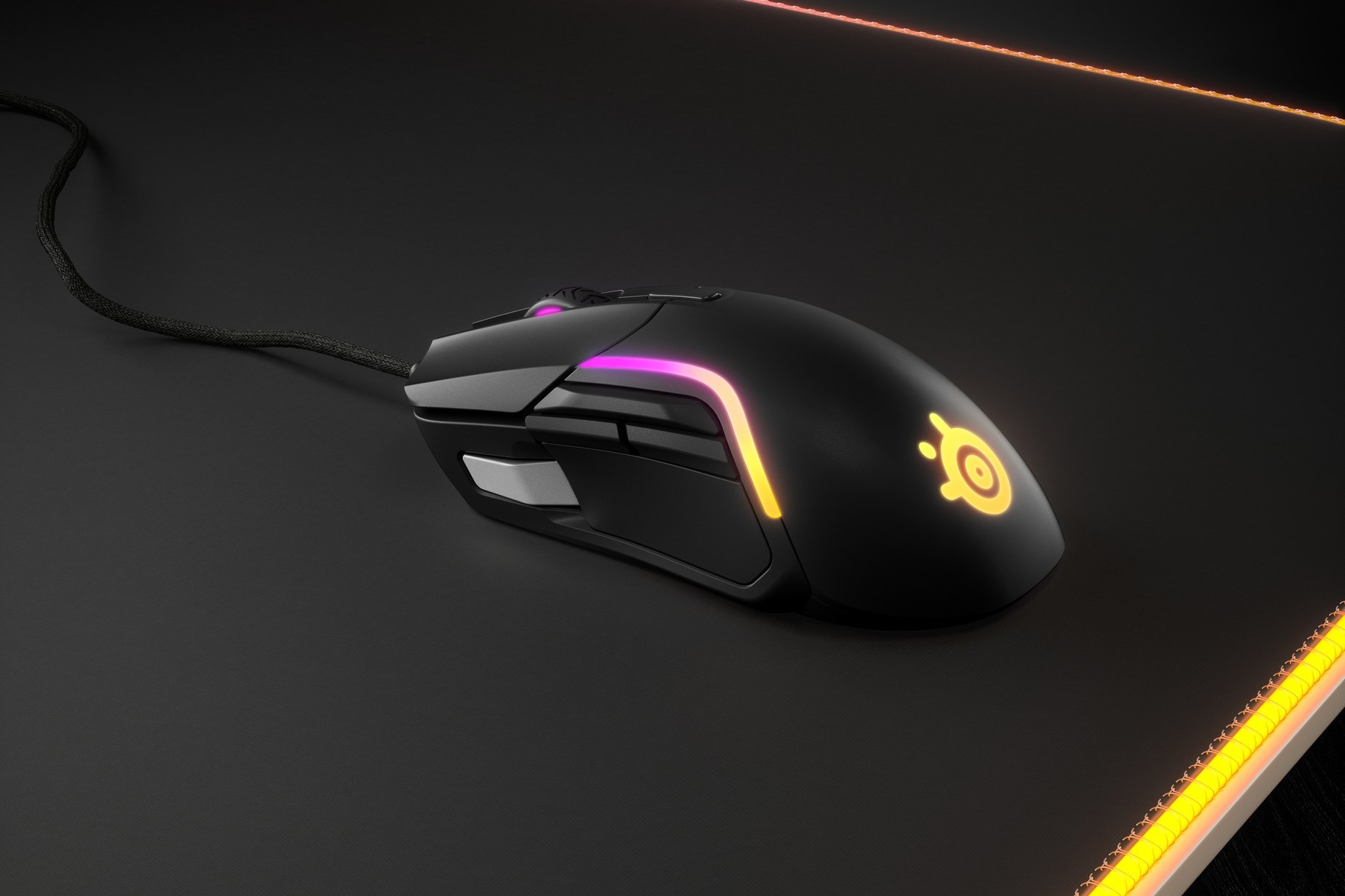 
 The Rival 5 gaming mouse against a mousepad.
 