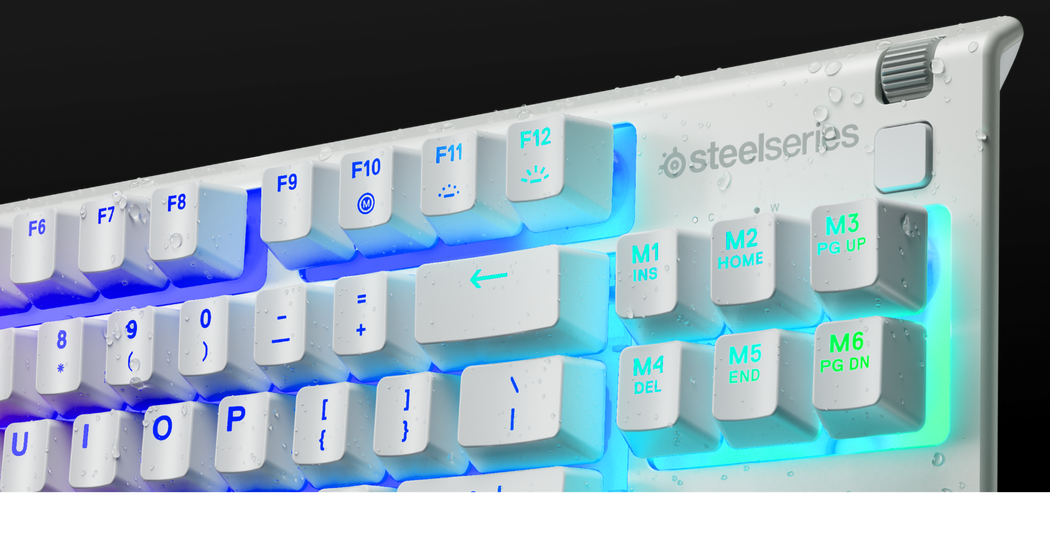 Closeup of the Apex 3 TKL keyboard with beads of moisture - showing off the water resistant nature of the keyboard.