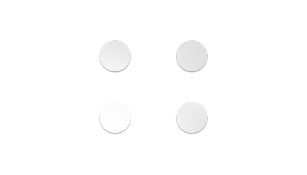 
 Overhead view of the Aerox 3 PFTE Mouse Feet, which consist of 4 clear circular mouse skates.
 