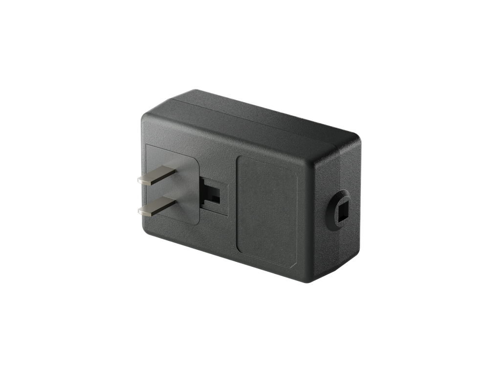 
 An image of the power adapter for speakers Arena 9.
 