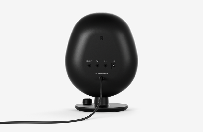 A look at the back of the Arena 3 speaker showing its multiple connection points, including a jack for headset, aux, PC, and a DC power port.